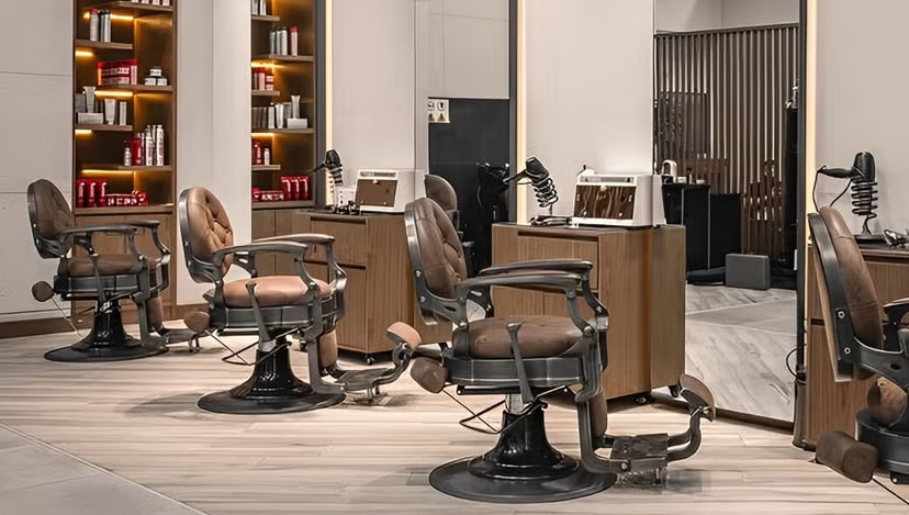 Interior of Scissors & Razors men's grooming salon in Dubai